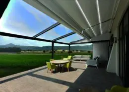 Pergola Iberis z ukośnym, rozsuwanym dachem z tkaniny PCV